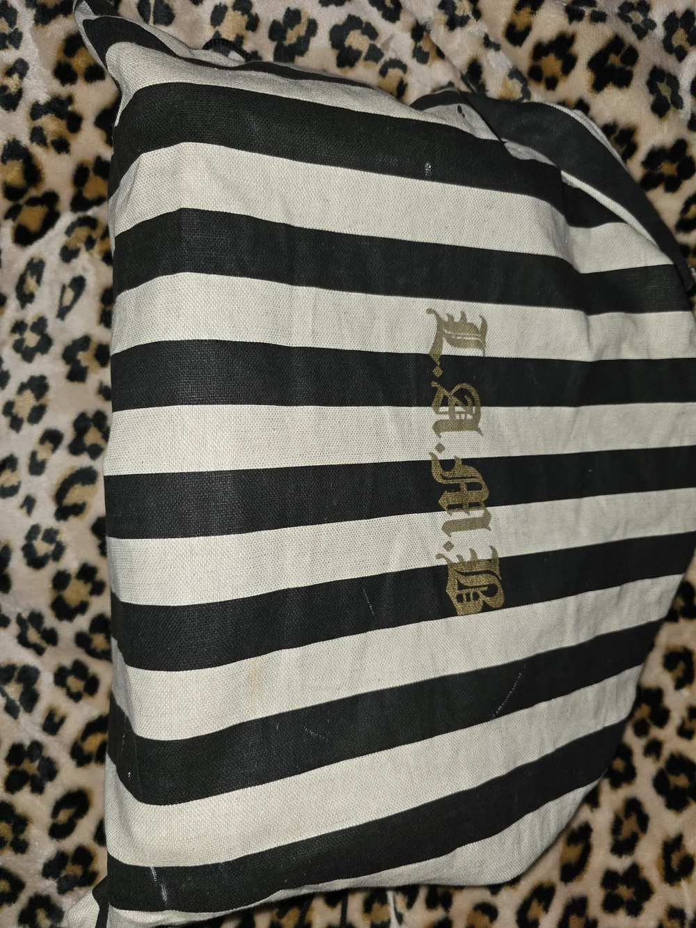 This is a L.A.M.B. by Gwen Stefani monogram Boston bag